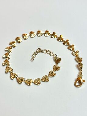 Gold diamond cut heart bracelet